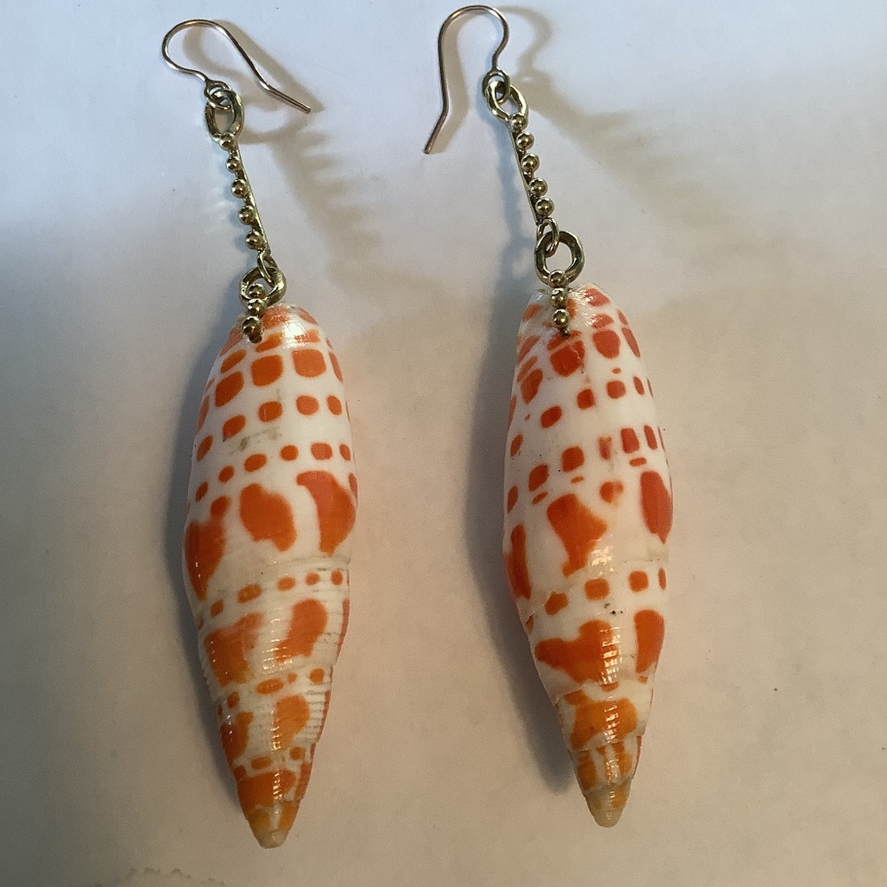 Ulla Johnson seashell earrings.